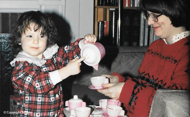 Harriet pours tea for her mother